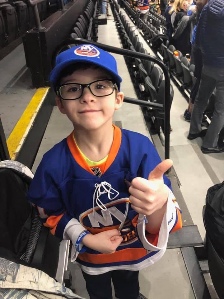 A Kids in Seats guest smiling during an event